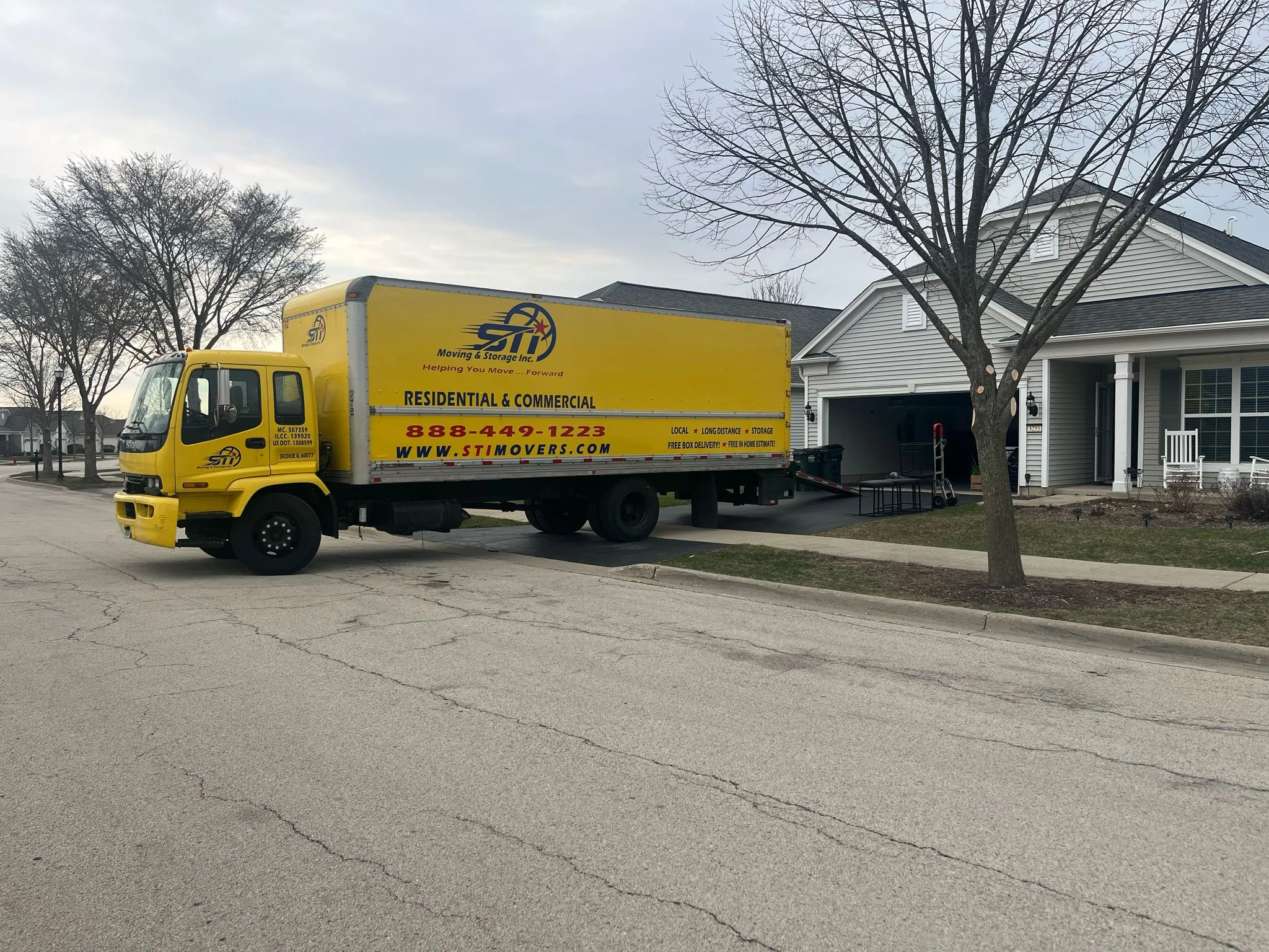 Moving truck in residential neighborhood near Cottonwood Drive Island Lake IL
